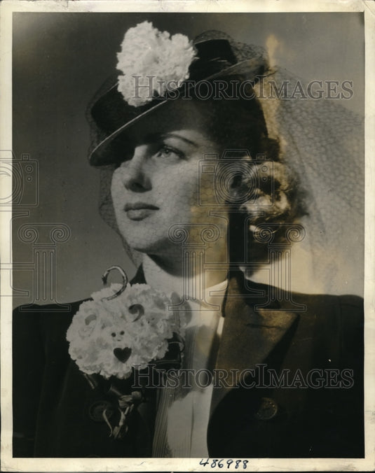 1939 Press Photo A boutonniere of flowers on hat & lapel  for Valentine's Day - Historic Images