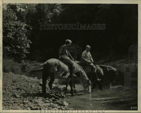 1930 Press Photo Forest Ranger & Wife on Horseback at Stream - Historic Images