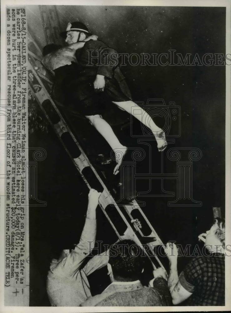 1947 Press Photo Fireman Walter Weiman, Tela Zafer Clark Hotel Fire - Historic Images