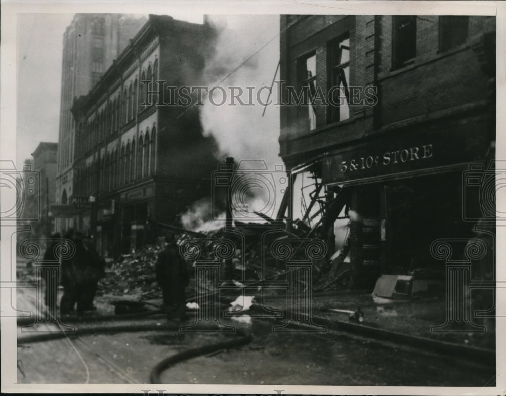 1937 Press Photo Early morning fire destroys two blocks in the business section - Historic Images