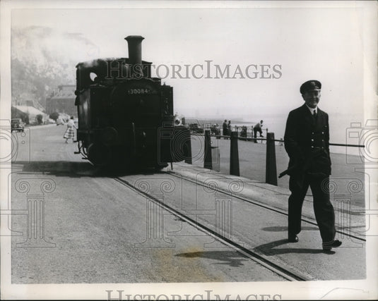 1958 Press Photo Stroller Walks along Railroad Tracks at Dover England - Historic Images