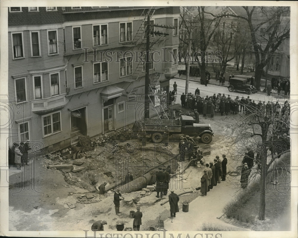 1931 Press Photo General top view of the damage caused by the broken main - Historic Images