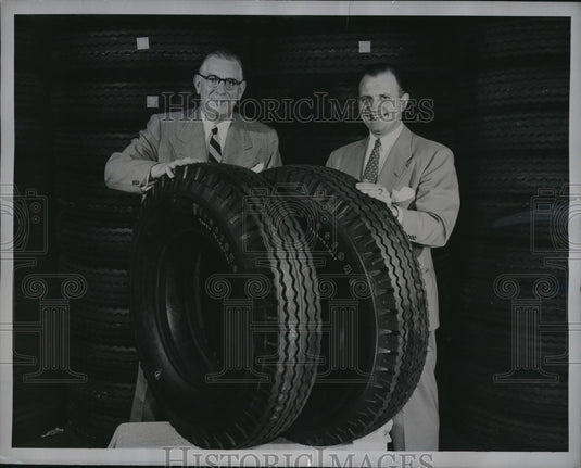 1952 Press Photo Firestone officials HB Tompkins & CS Gischel with tires - Historic Images