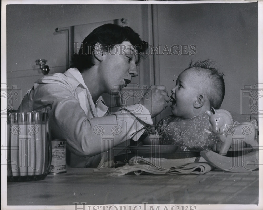 1950 Press Photo St Jacques Sr student &amp; baby at foundling home-Historic Images