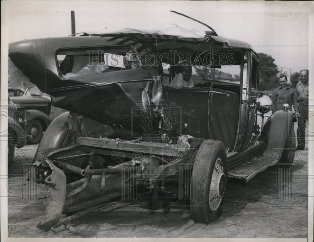 1938 Press Photo Cammel Brexton in Car Wreckage After Being Hit by a Train-Historic Images