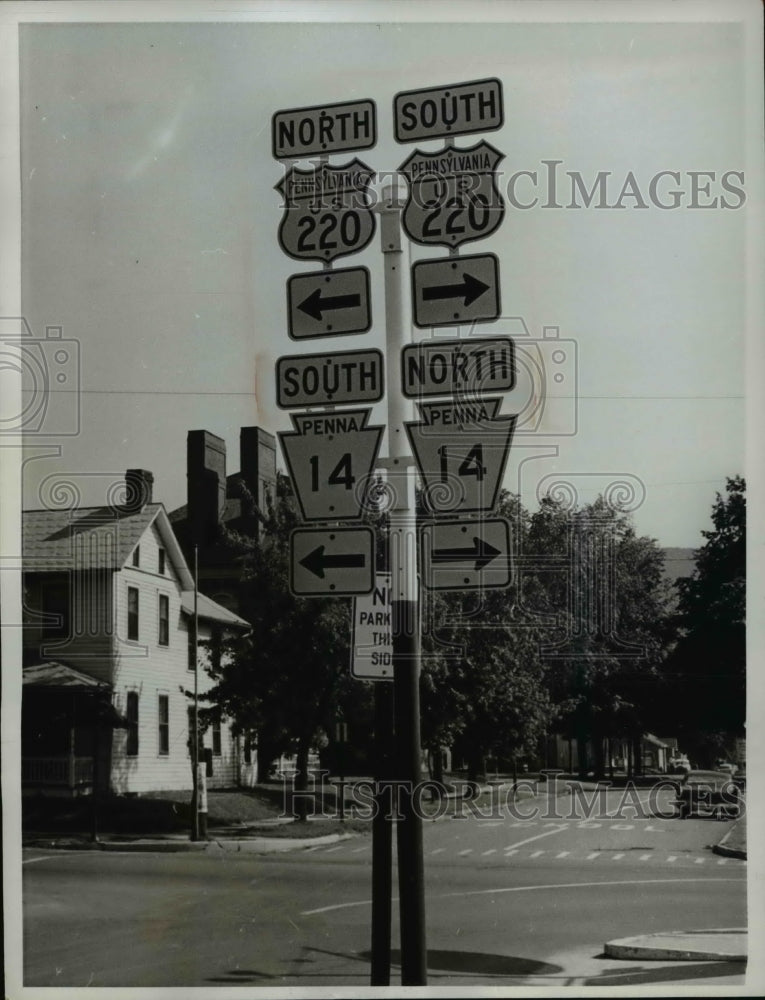 1961 Press Photo Montoursville Pa. Church, signs have to be wrong? - Historic Images