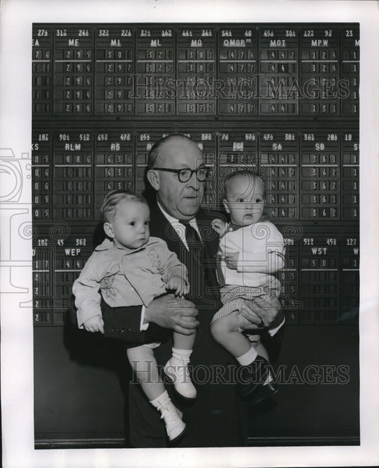 1954 Ray Lamb Merrill Lynch broker with RE Jancigar & SA Arbaugh-Historic Images