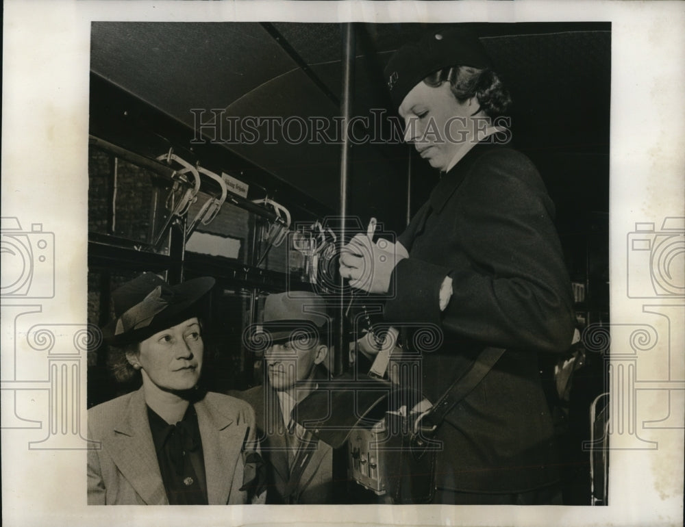 1940 Press Photo Finnish Conductor in street car-Historic Images