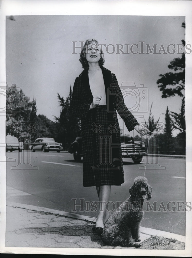 1956 Press Photo Reversible plaid coat and skirt ensemble by Johnston of Dallas-Historic Images