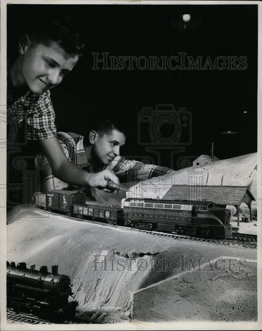 1960 Press Photo Two Boys Play With Model Train Set-Historic Images