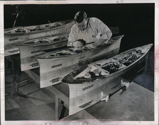 1951 John Heuss assembles fighter jet pylons for Westinghouse - Historic Images