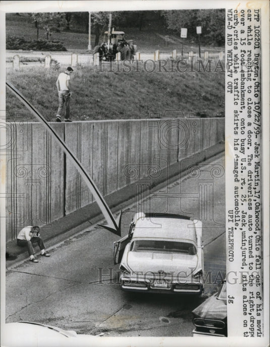 1959 Press Photo Scene of Teenager Jack Martin Falling from Moving Car, Ohio-Historic Images