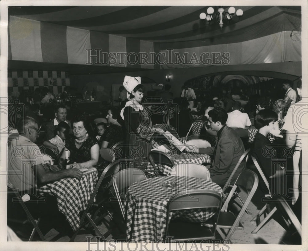 1962 Rohan Ferris serves a diner in the French Cafe  - Historic Images