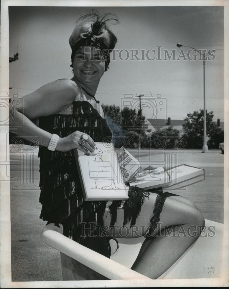 Press Photo Argerie Hoty Sits on Edge of Bathtub to be Filled with Packages-Historic Images