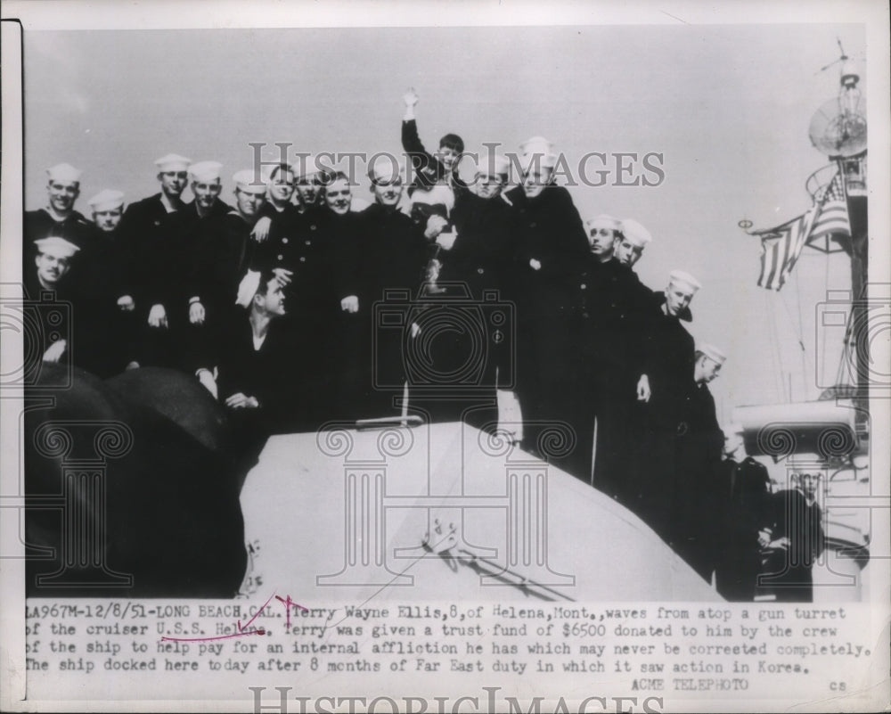 1951 Press Photo Terry Wayne Ellis waves from atop a gun turret - ney28007-Historic Images