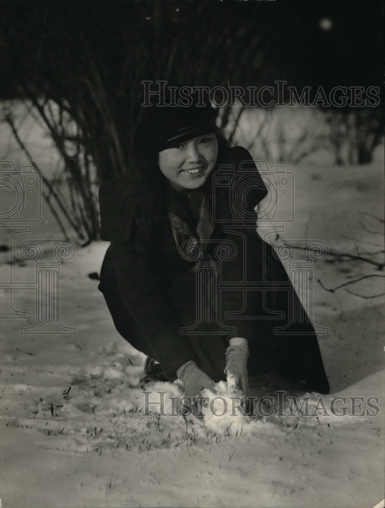 1922 Press Photo Eskimo Girl with New American Name Playing In Sleet &amp; Snow - Historic Images
