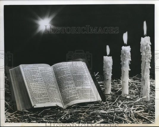 1958 Press Photo Scene of Christmas Spirit Captured with Bible, Star & Candles - Historic Images
