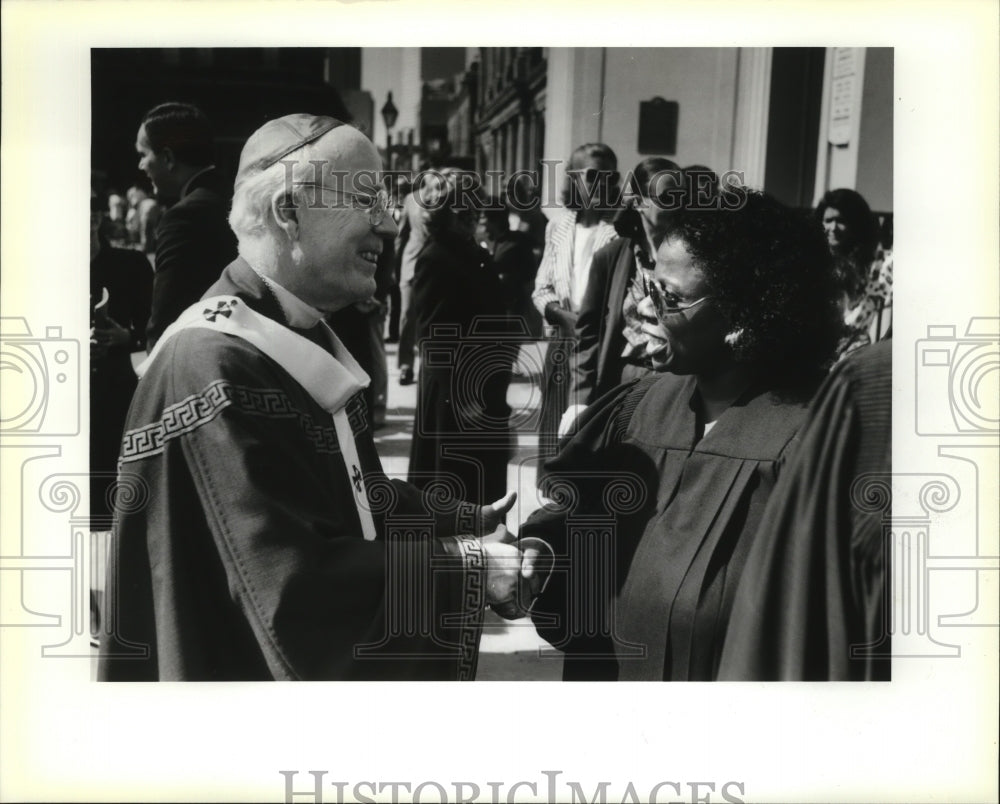 1989 Reverand F.B. Schulte greets Judge Joan B. Armstrong, Red Mass-Historic Images