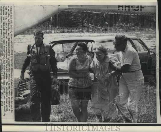 1969 Press Photo Elderly Woman Taken to Helicopter after Hurricane Camille - Historic Images