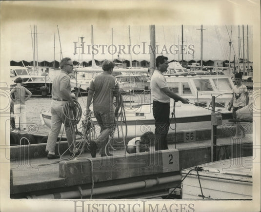 1969 Press Photo Men Tying a Boat to Dock, Hurricane Camille - noa00279 - Historic Images