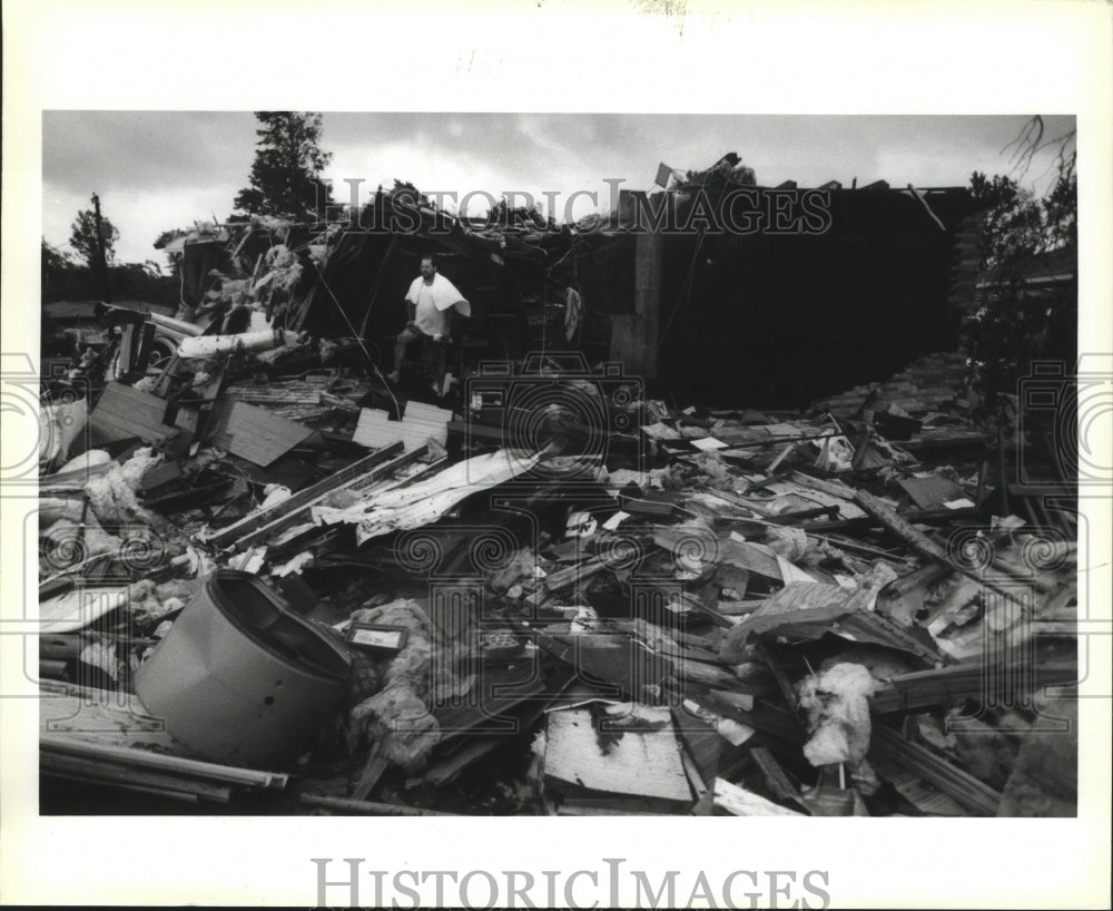 1992 Hurricane Andrew - Wayne Forsythe of Reserve, surveys damage. - Historic Images