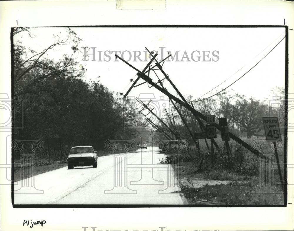 1992 Hurricane Andrew - Bent power lines on Highway 182. - Historic Images