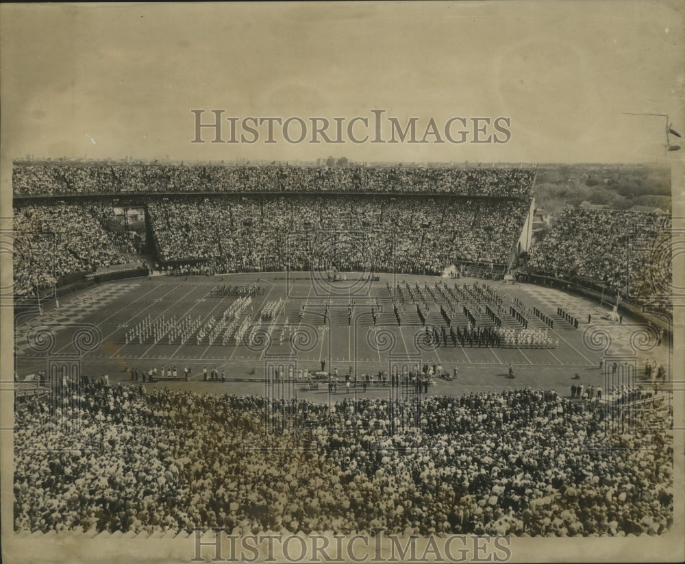 1957 Sugar Bowl - Bands line the field in jam packed stadium. - Historic Images