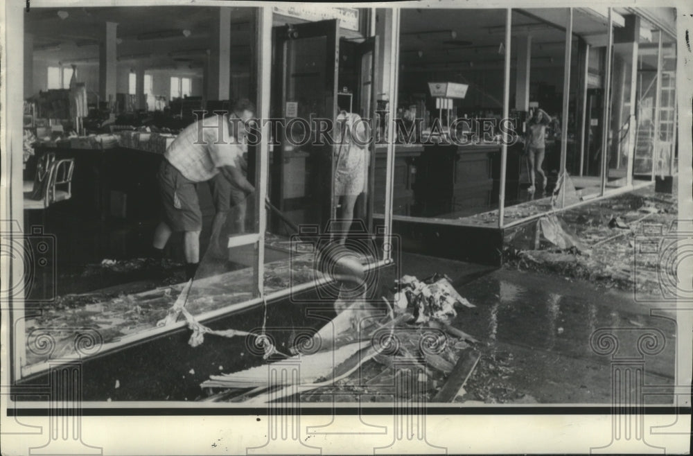 1969 Shopkeepers Beginning the Task of Cleaning up Store in Gulfport - Historic Images