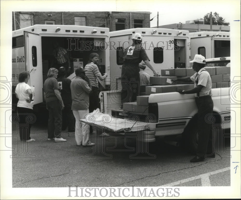 1992 Hurricane Andrew - American Red Cross assists Entergy employees - Historic Images