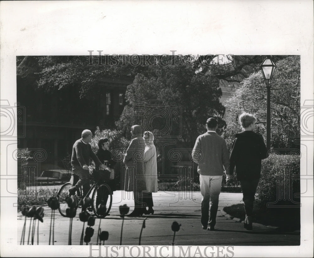 1965 People out for a walk in Jackson Square, New Orleans. - Historic Images