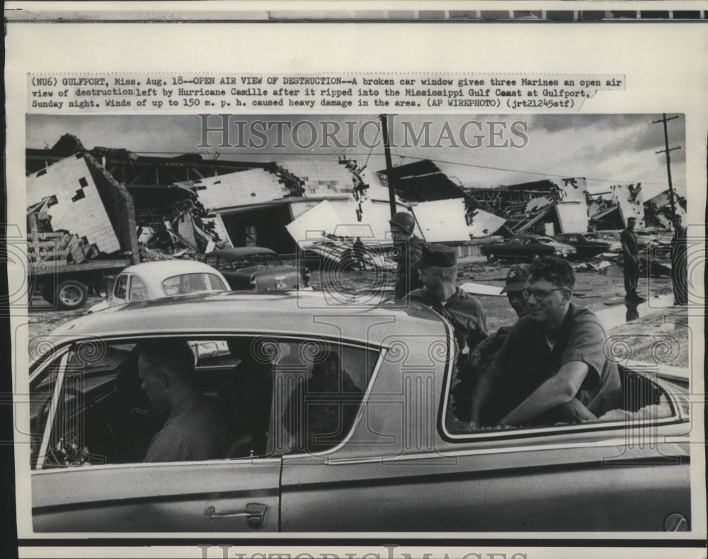 1969 Press Photo Hurricane Camille-Three Marines ride in car with broken window - Historic Images