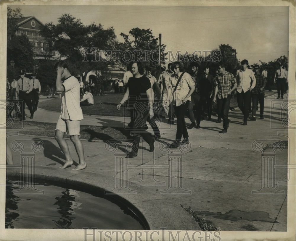 1967 Line of Men Walks the Street Once Arrested on Jackson Square - Historic Images