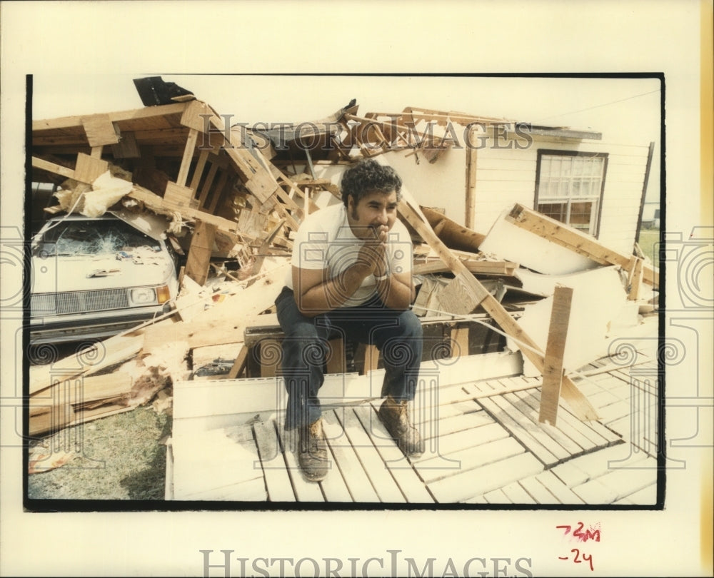 1988 Hurricane Gilbert - Enrique Salinas at damaged home in Edcouch. - Historic Images