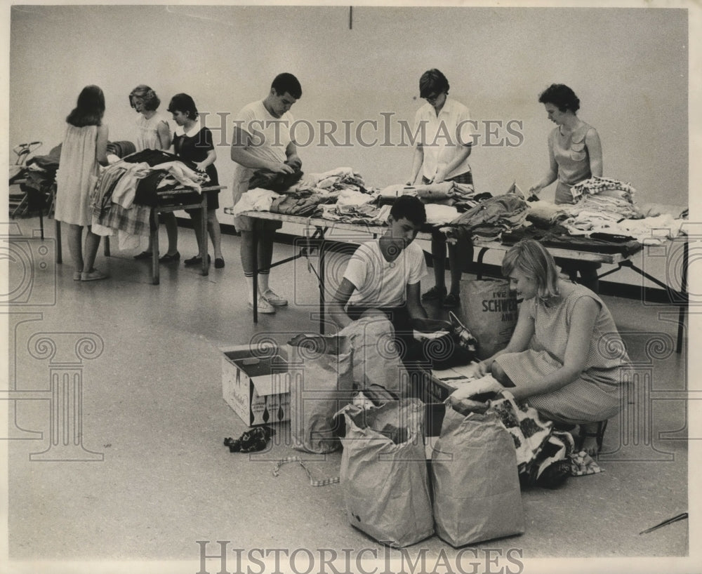 1965 Volunteers Help out in the Aftermath of Hurricane Betsy - Historic Images