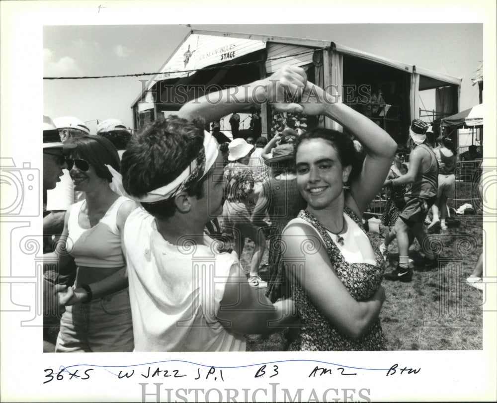 1994 New Orleans Jazz Festival - Tom Kress and Nina Skinner dancing. - Historic Images