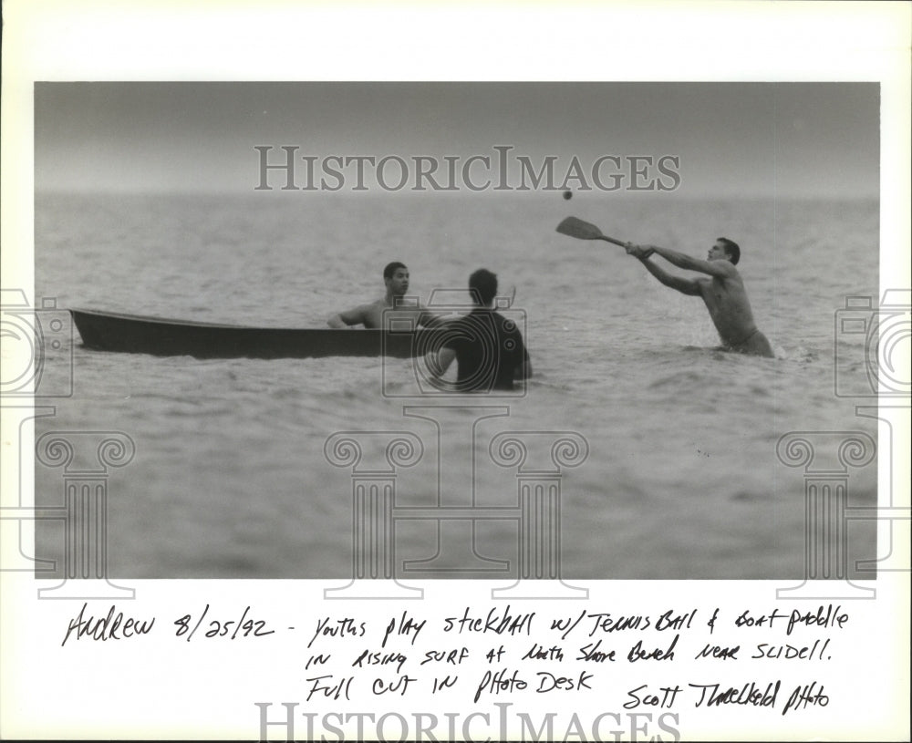 1992 3 Guys Playing in Lake Pontchartrain before Hurricane Andrew - Historic Images