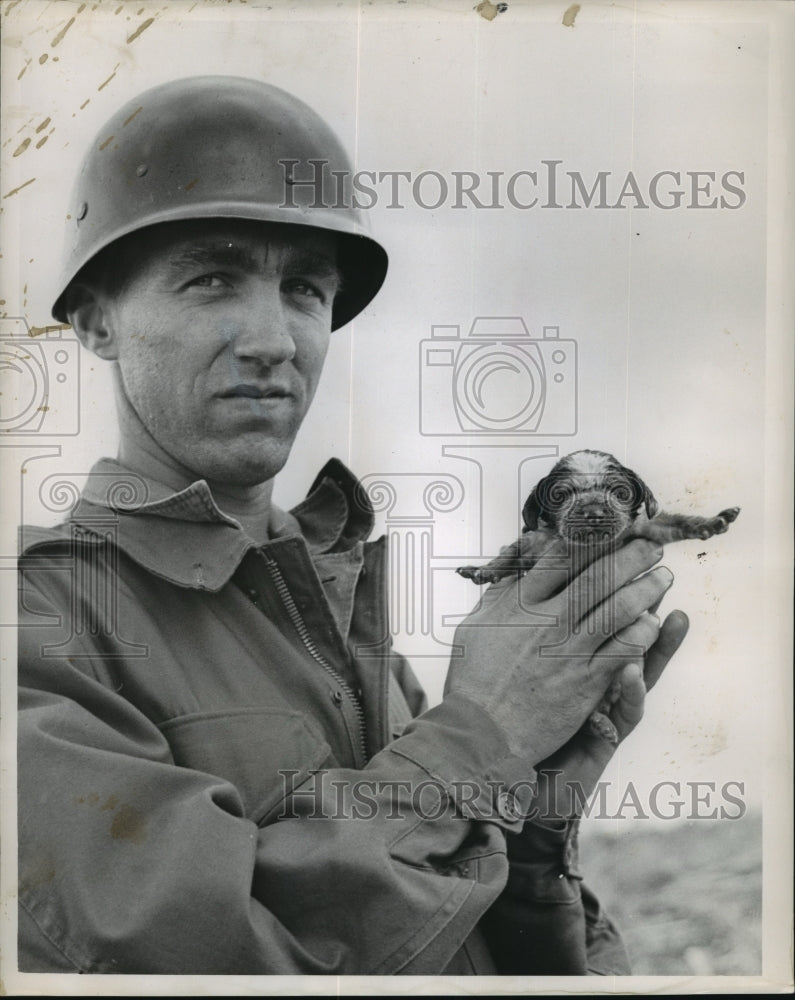 1964 Press Photo Larose Tornado- Wayne Herbert holds puppy who survived tornado-Historic Images