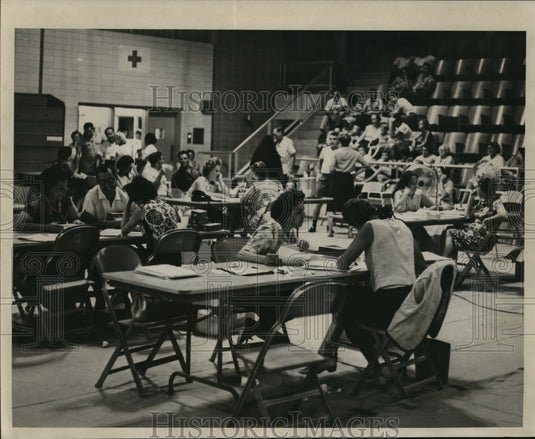 1965 Hurricane Betsy- Aid center for victims. - Historic Images
