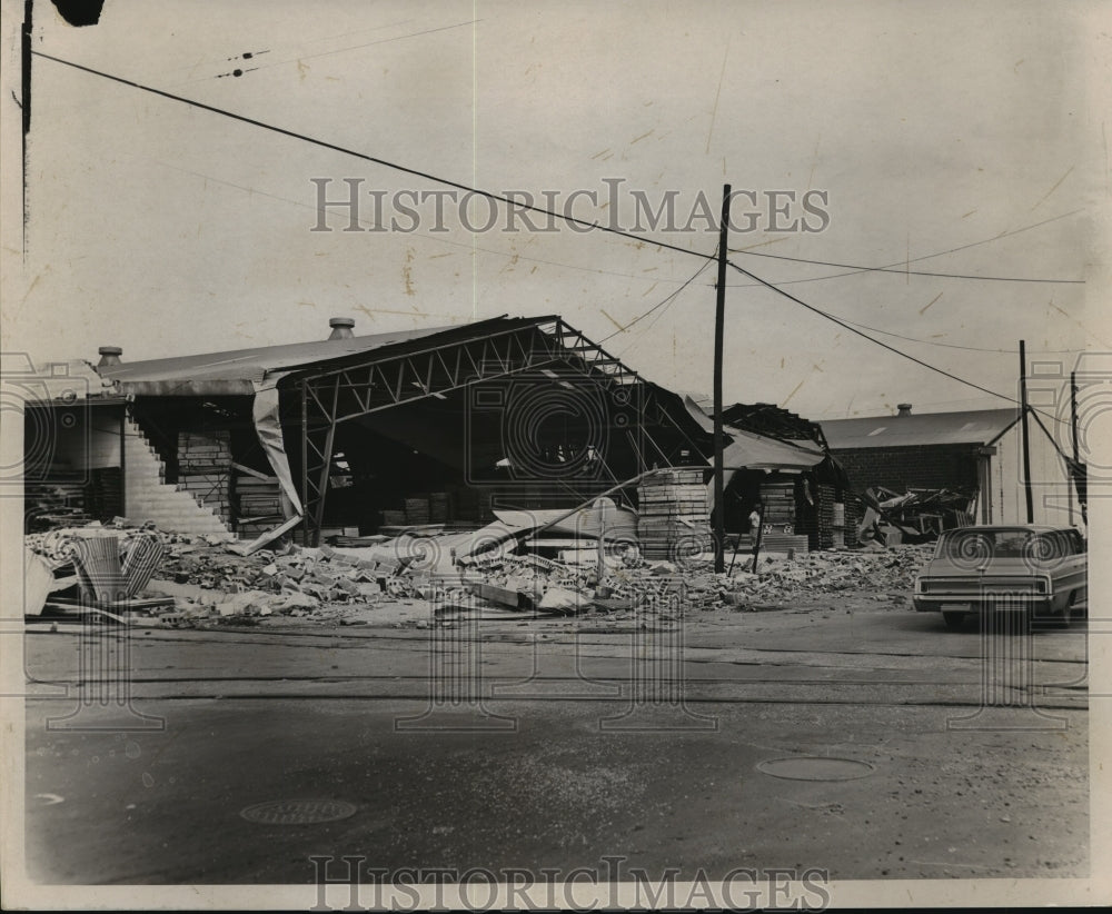 1965 Hurricane Betsy-Warehouse on Tchoupitoulas St suffers damage. - Historic Images