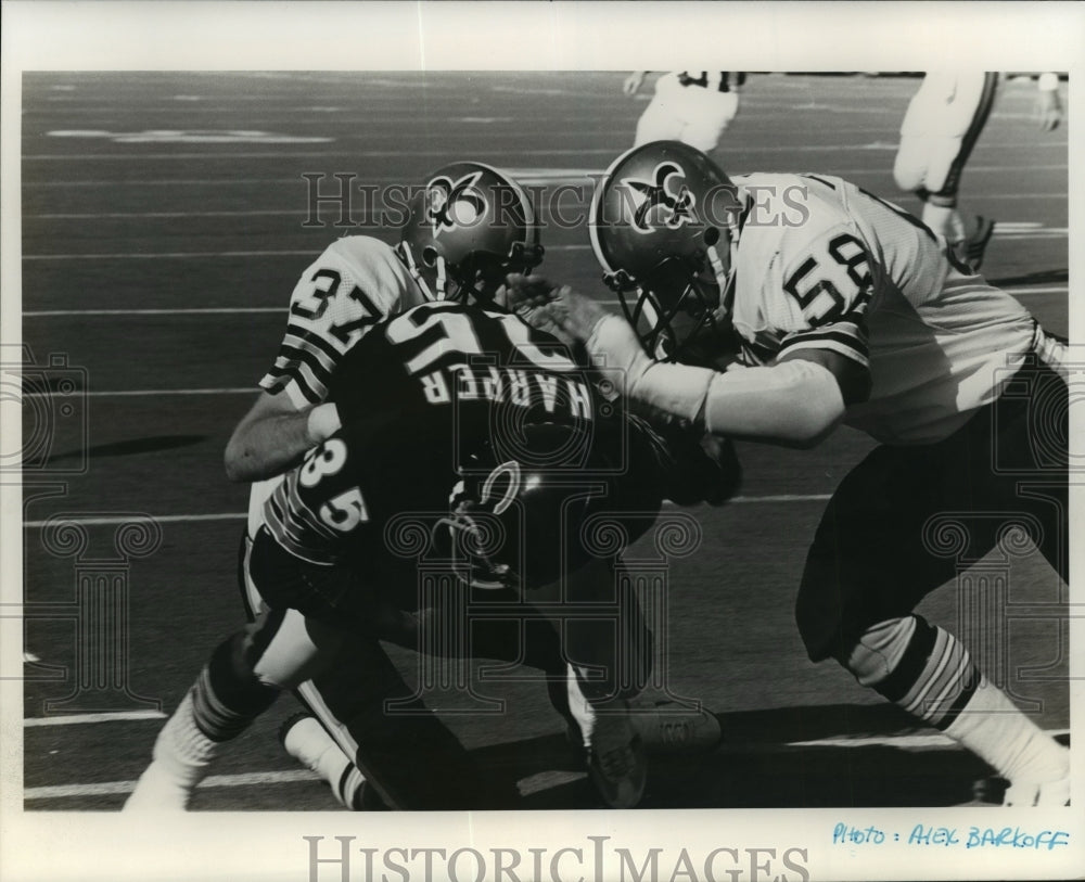 New Orleans Saints - Bears #25 tackled by Saints&#39; #37 and #58. - Historic Images