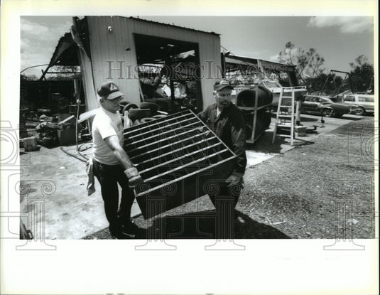 1992 Press Photo Hurricane Andrew - Tony Oliveri & Jerry Jacob Sr. clean up. - Historic Images