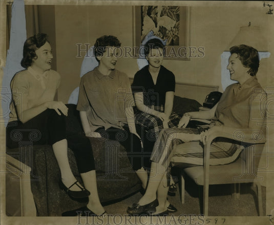 1958 Sugar Bowl - Clemson Tigers' wives talk over the game. - Historic Images
