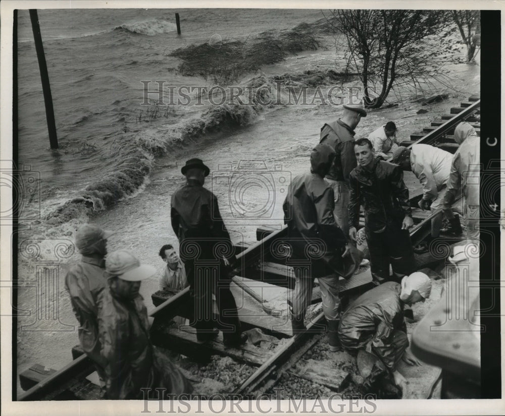 1964 Hurricane Hilda - Flood waters rise up to the railroad tracks. - Historic Images