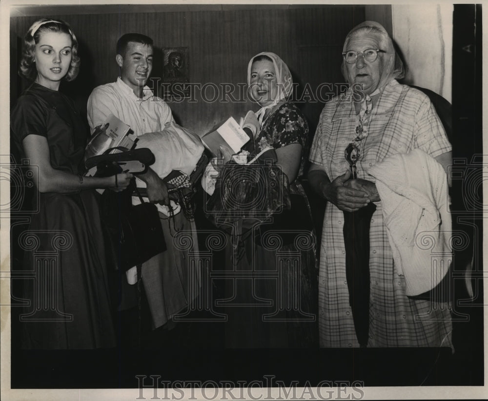 1964 Hurricane Hilda - Storm Evacuees Carrying Personal Items - Historic Images