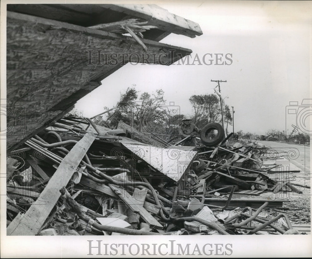 1964 Press Photo Hurricane Hilda - Man Sifts Through Debris Left by Storm-Historic Images