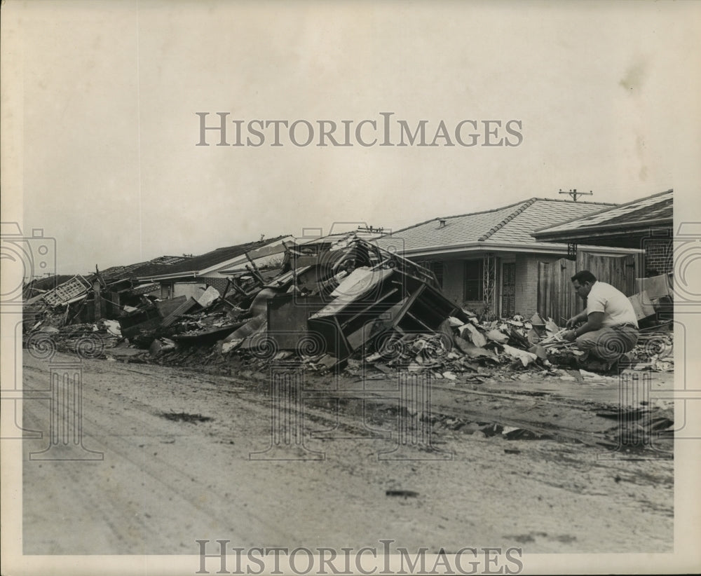 1965 Hurricane Betsy- Man looks at devastation in Carolyn Park. - Historic Images