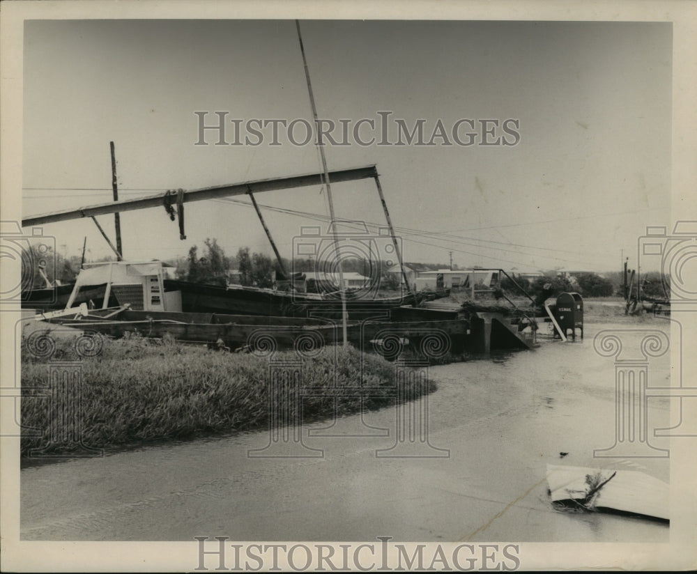 1965 Hurricane Betsy - A boat and buildings damaged in New Orleans. - Historic Images