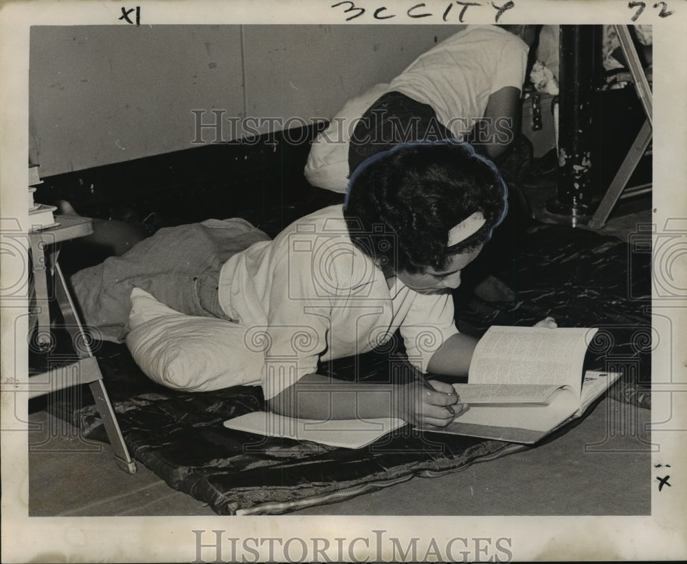 1965 Hurricane Betsy - A student at the Chalmette Junior High School - Historic Images