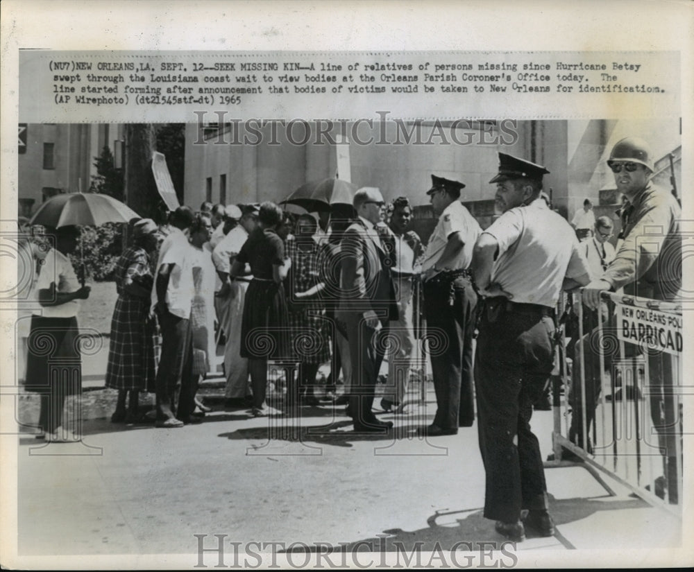 1965 Hurricane Betsy-A  line of relatives of persons missing. - Historic Images