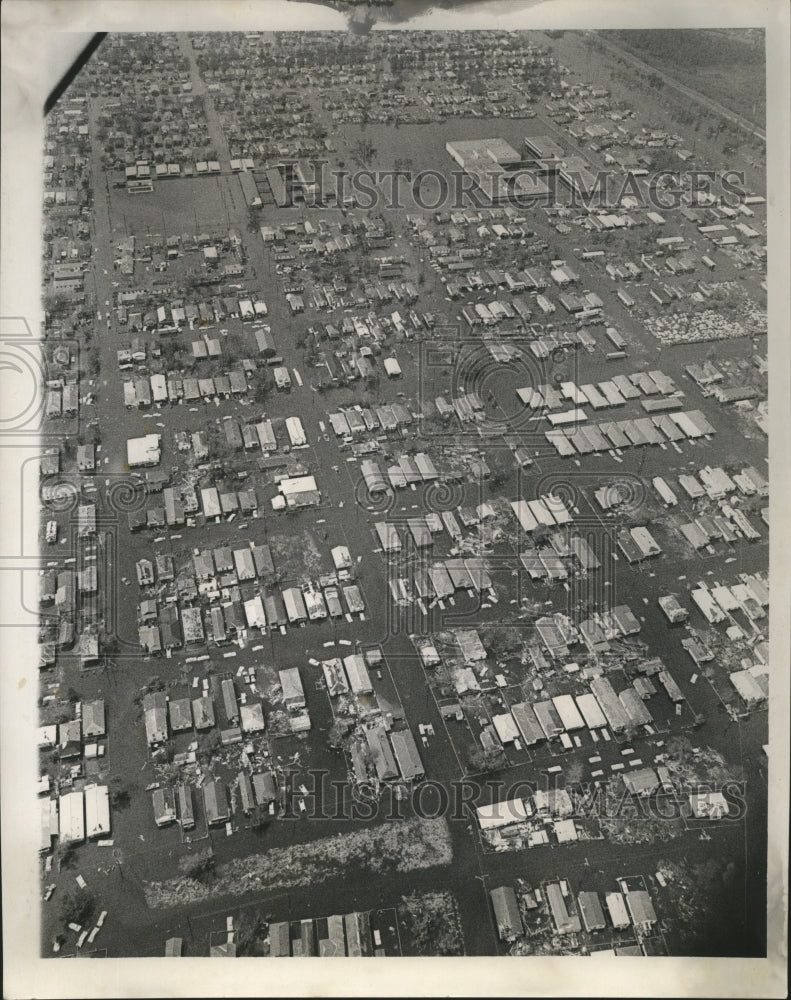 1965 Hurricane Betsy-Donna Vella subdivision under flood waters. - Historic Images